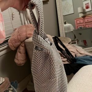 Silver going out purse